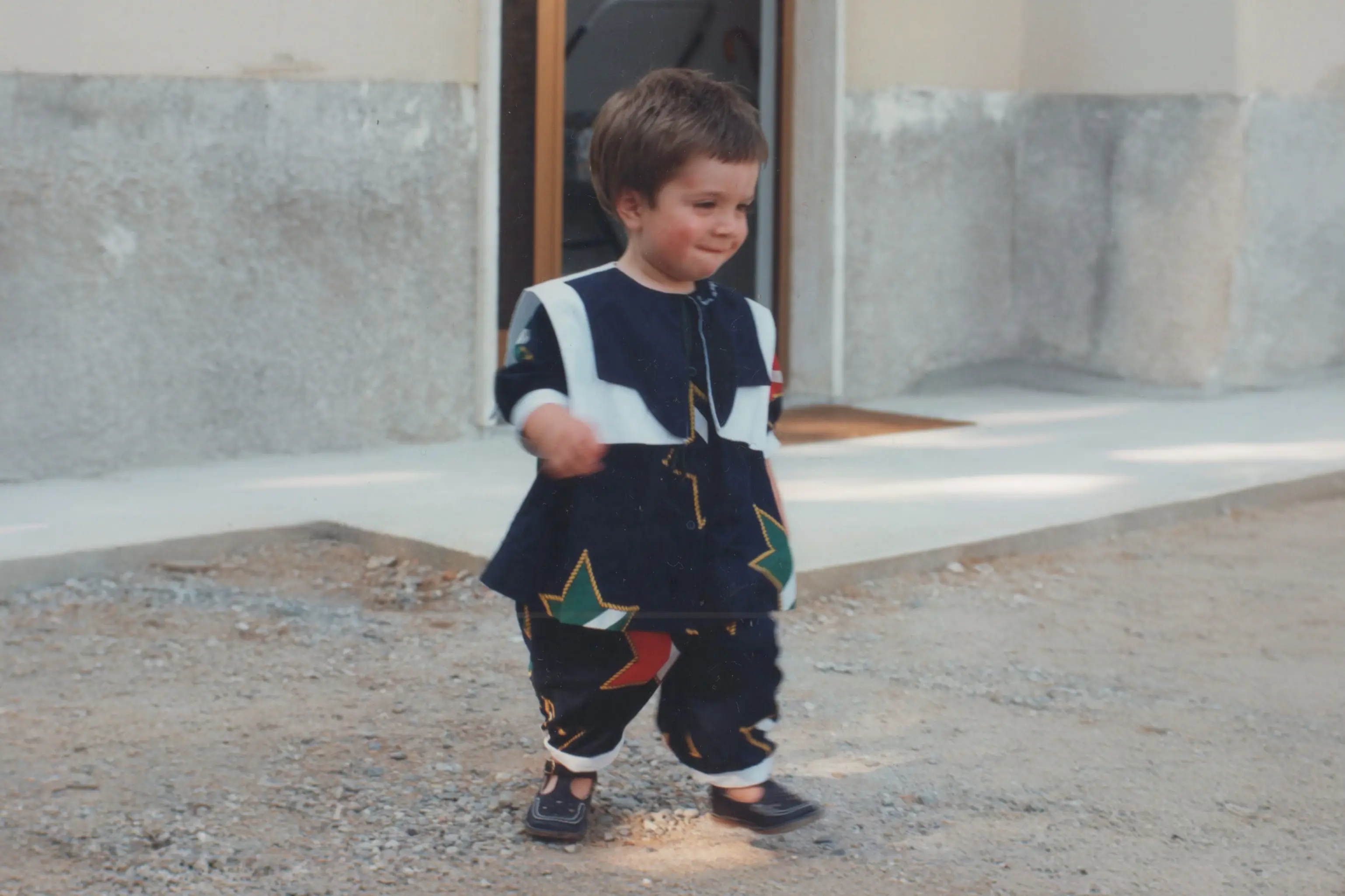 A very young Web Designer and Webflow developer wearing a dripping outfit.